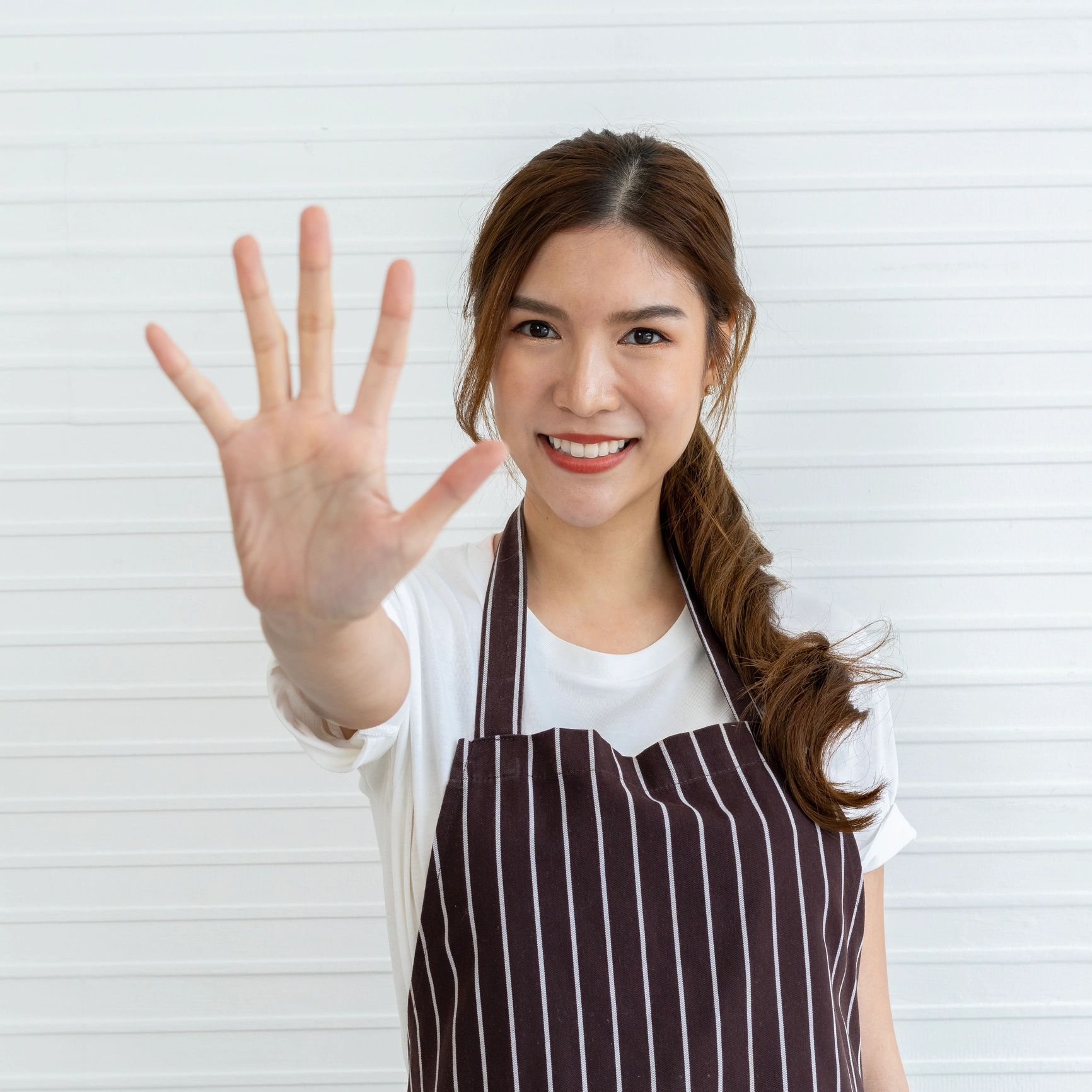 Cafe team member portrait in an apron